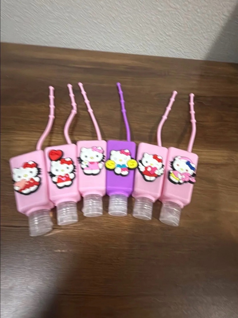 Kids Pink & Purple Character Silicone Hand Sanitizer Holders